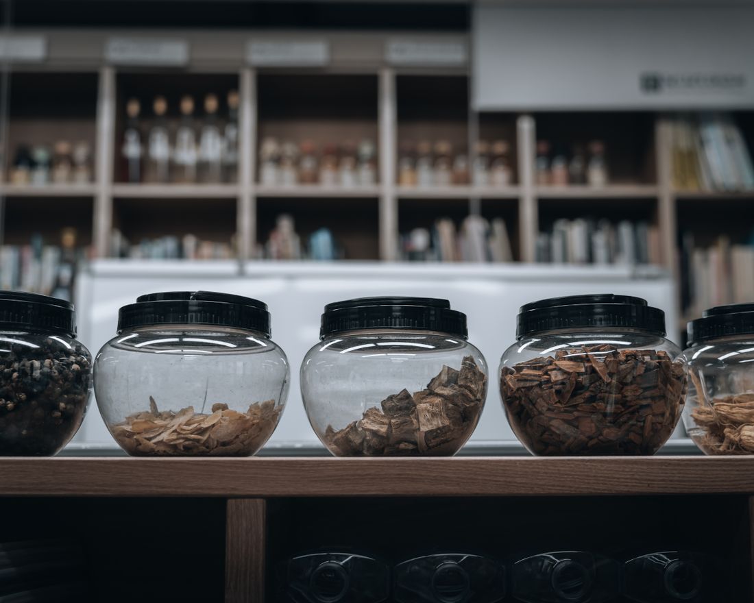 Traditional Chinese medicine herbs in glass jars