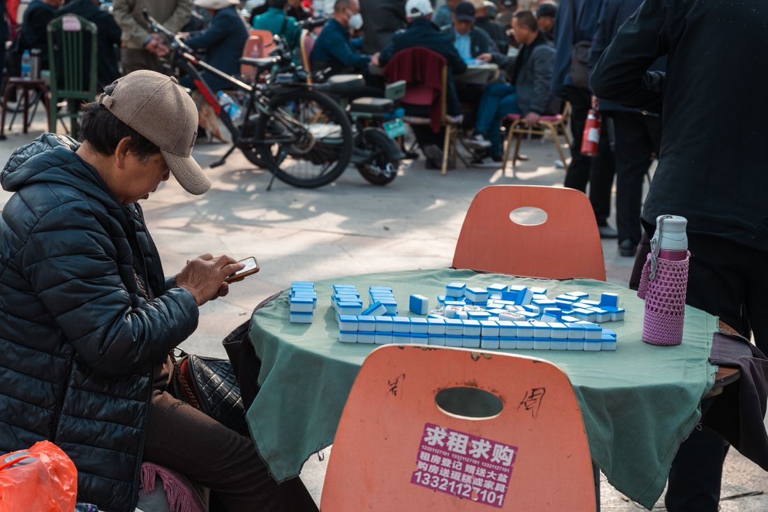 People playing mahjong in a Chengdu park