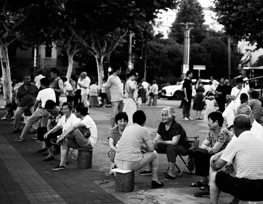 People socialising in Shanghai morning park