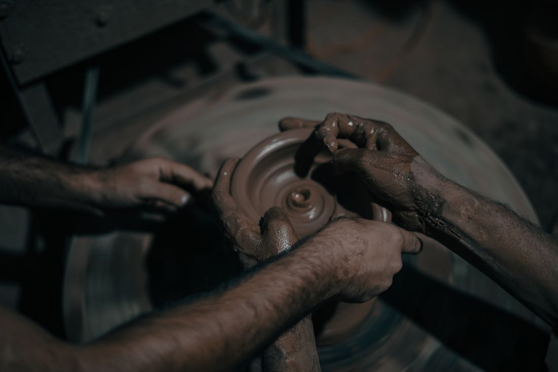 Hands shaping clay pottery workshop Xi'an