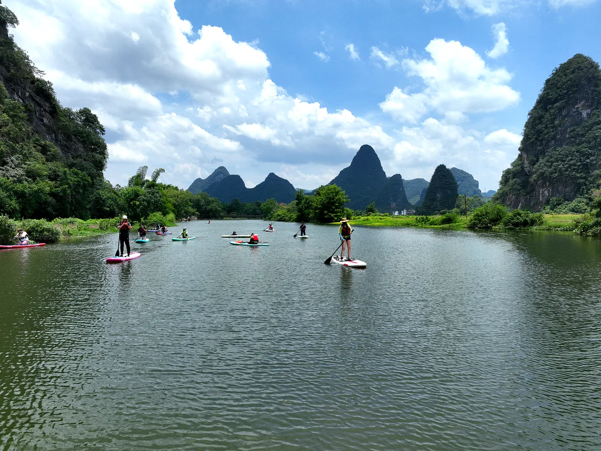 Clear water and limestone towers on the Yulong River, Yangshuo